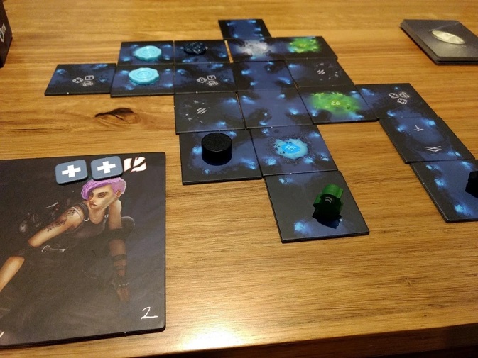 Sub Terra board mid way through the game, there's one horror very close to a green adventurer.