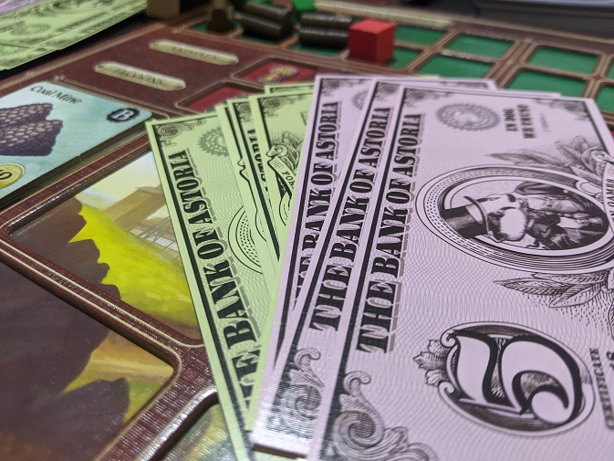 Showing some of the money you get within the game. It feels like plastic to the touch.
