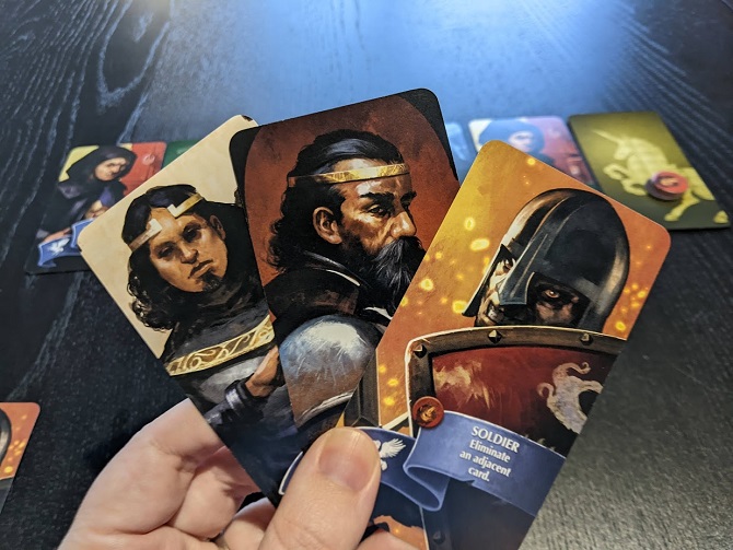 Three character cards from Oriflamme, the Soldier, King, and Heir