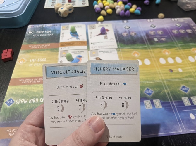 Two end game goal cards, collect birds that eat fruit, and collect birds that eat fish.