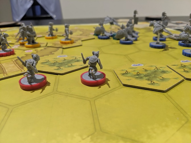 In the distance the Macaws are fighting the Bear army. The camera is focuses on two Ocelots on a stealth mission.
