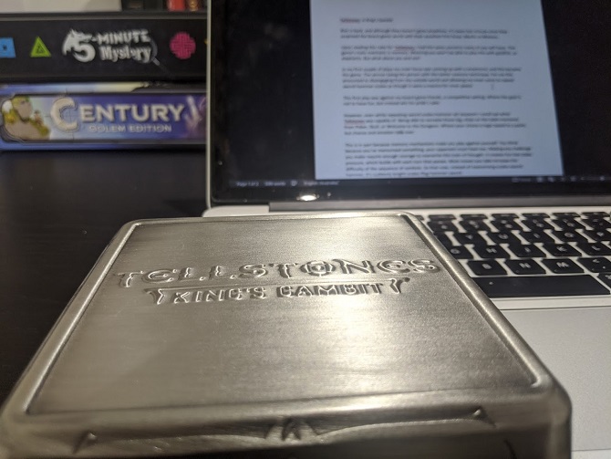 The metal box Tellstones King's Gambit comes in. It's shiny, and small.