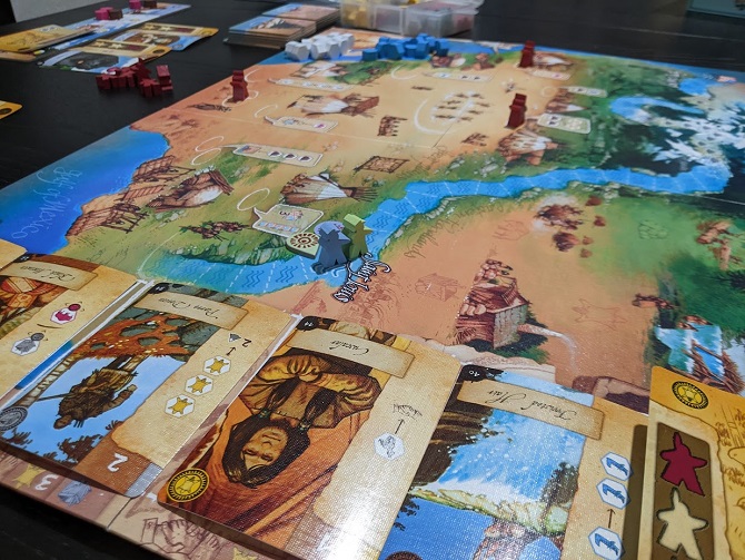 A top down look at the market, and the action spaces on the board.
