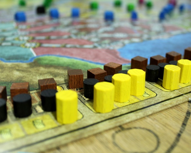 The four different resource tokens, coal, oil, garbage, and uranium (not pictured).