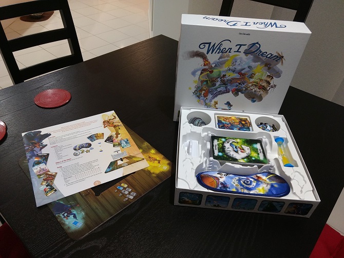 All components of the game are on display, sleeping mask, cards, card holder in the shape of a bed