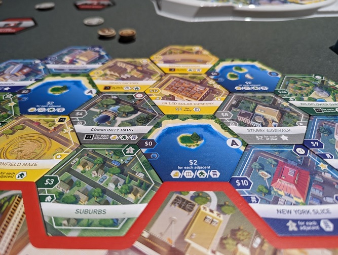 A borough with some of the new tiles, including Starry Sidewalk, Failed Solar Company, and Cornfield Maze.