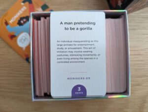 a card stating a man pretending to be a gorilla