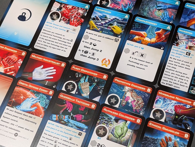A top-down grid of colourful leader cards from the expansion. Divided into blue A sides and red B sides, the cards feature distinct roles like Logistician, Fleet Dispatcher, and Ruthless Coloniser.